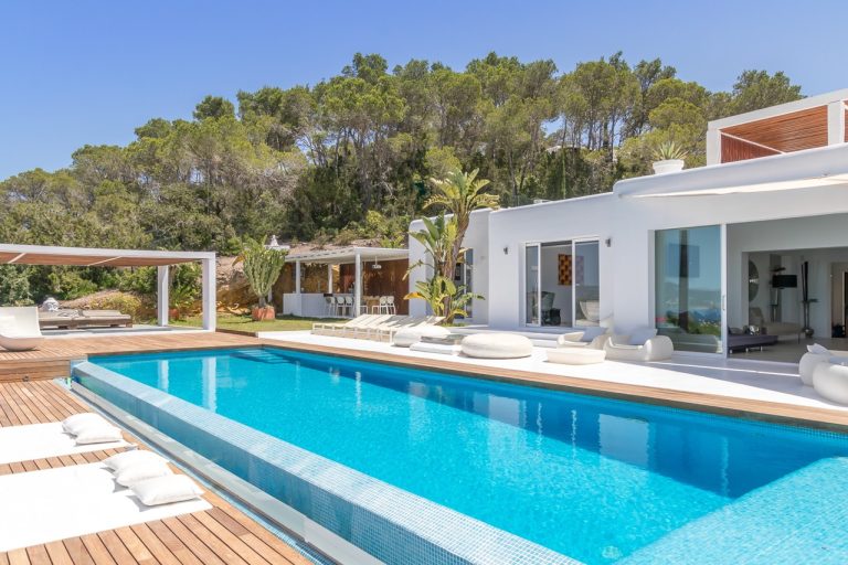 Exterior, modern villa with pool and wooden decking at Villa Sunset in Sant Josep, Ibiza